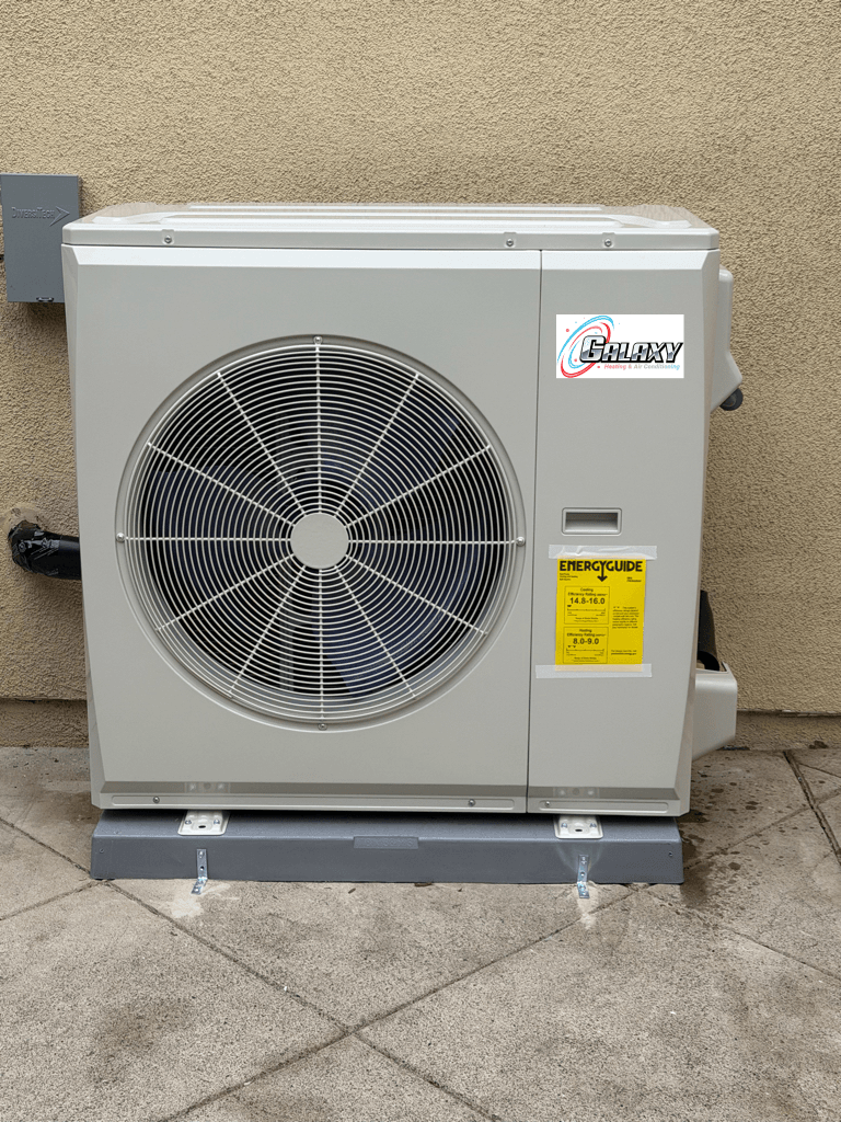Carrier heat pump outdoor condenser installed by Galaxy Heating & Air at an Alameda home
