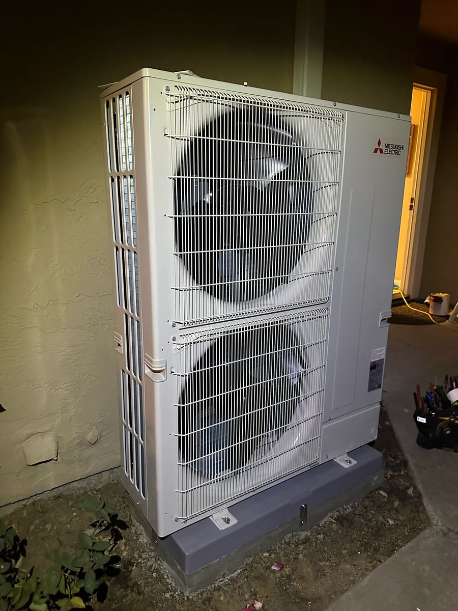 Mitsubishi Hyper-Heat 2-fan multi-zone heat pump outdoor unit installed by Galaxy Heating & Air at a Hillcrest Antioch home