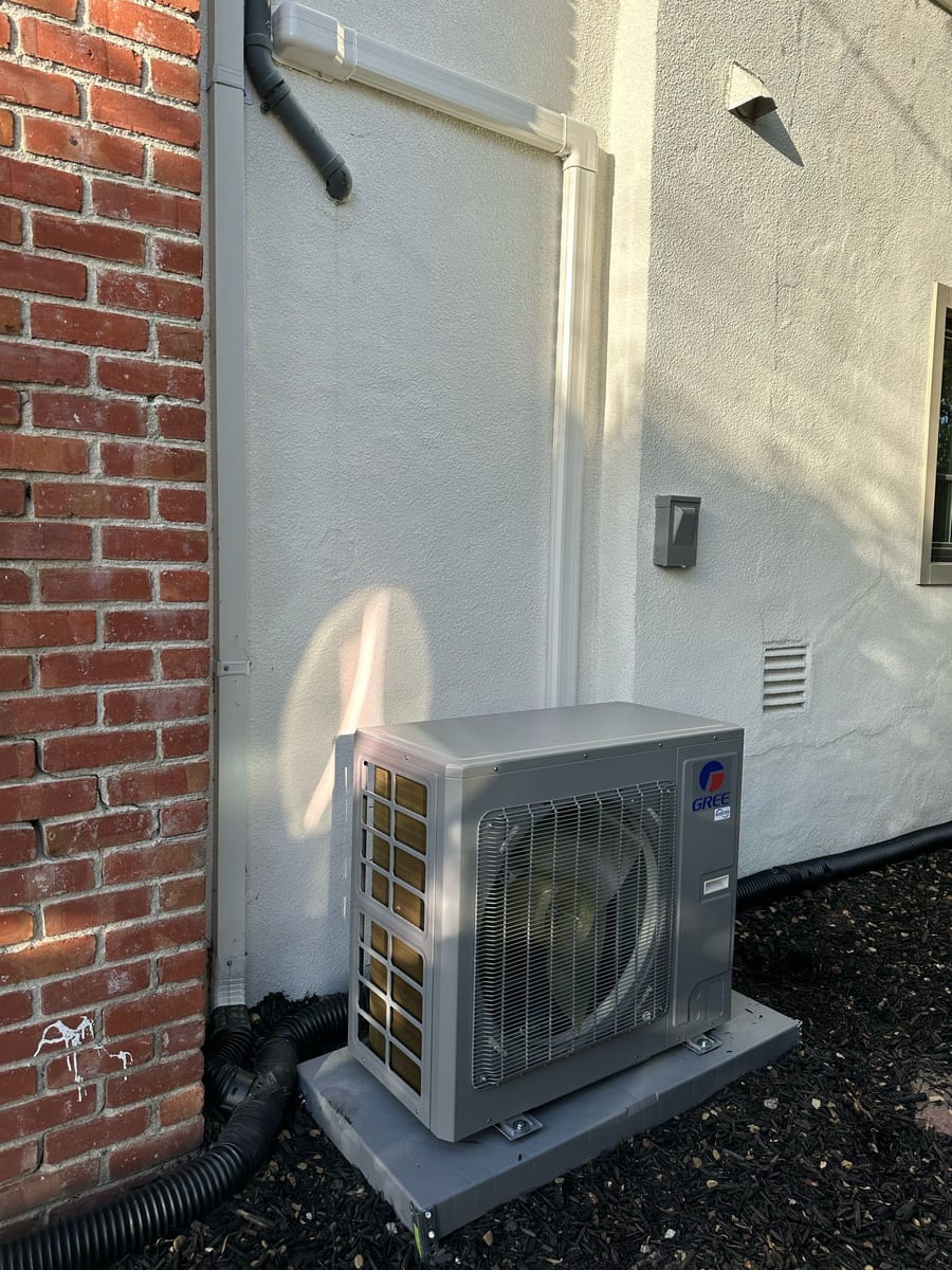 Gree compact inverter-driven heat pump outdoor unit installed by Galaxy Heating & Air at a Cambrian Park Campbell home