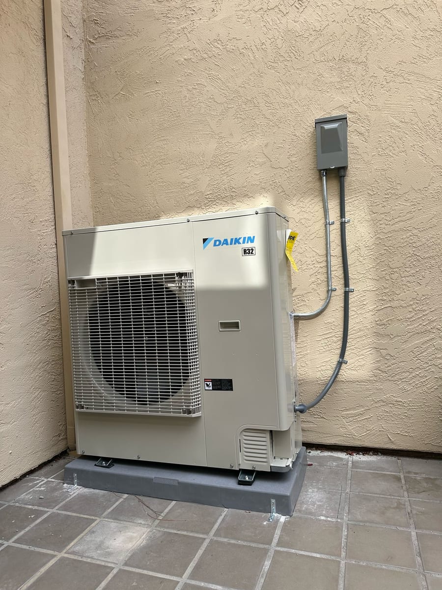 Daikin R32 inverter-driven heat pump outdoor unit installed by Galaxy Heating & Air at a West Dublin home