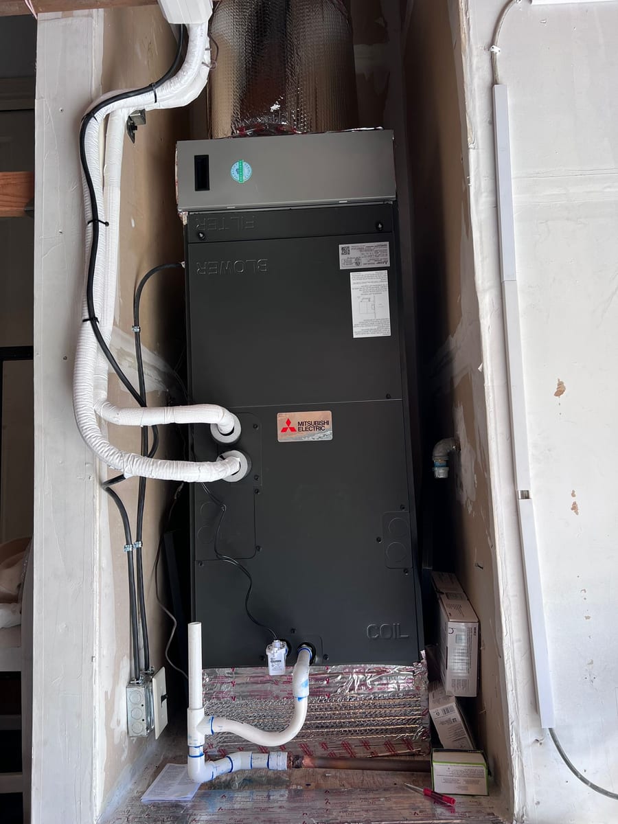 Mitsubishi Electric vertical air handler installed by Galaxy Heating & Air in a closet at a Lower Hillsborough home