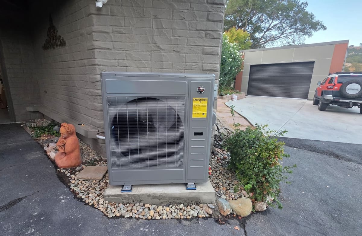 Rheem RDAY18 heat pump outdoor unit installed by Galaxy Heating & Air at a Lafayette home