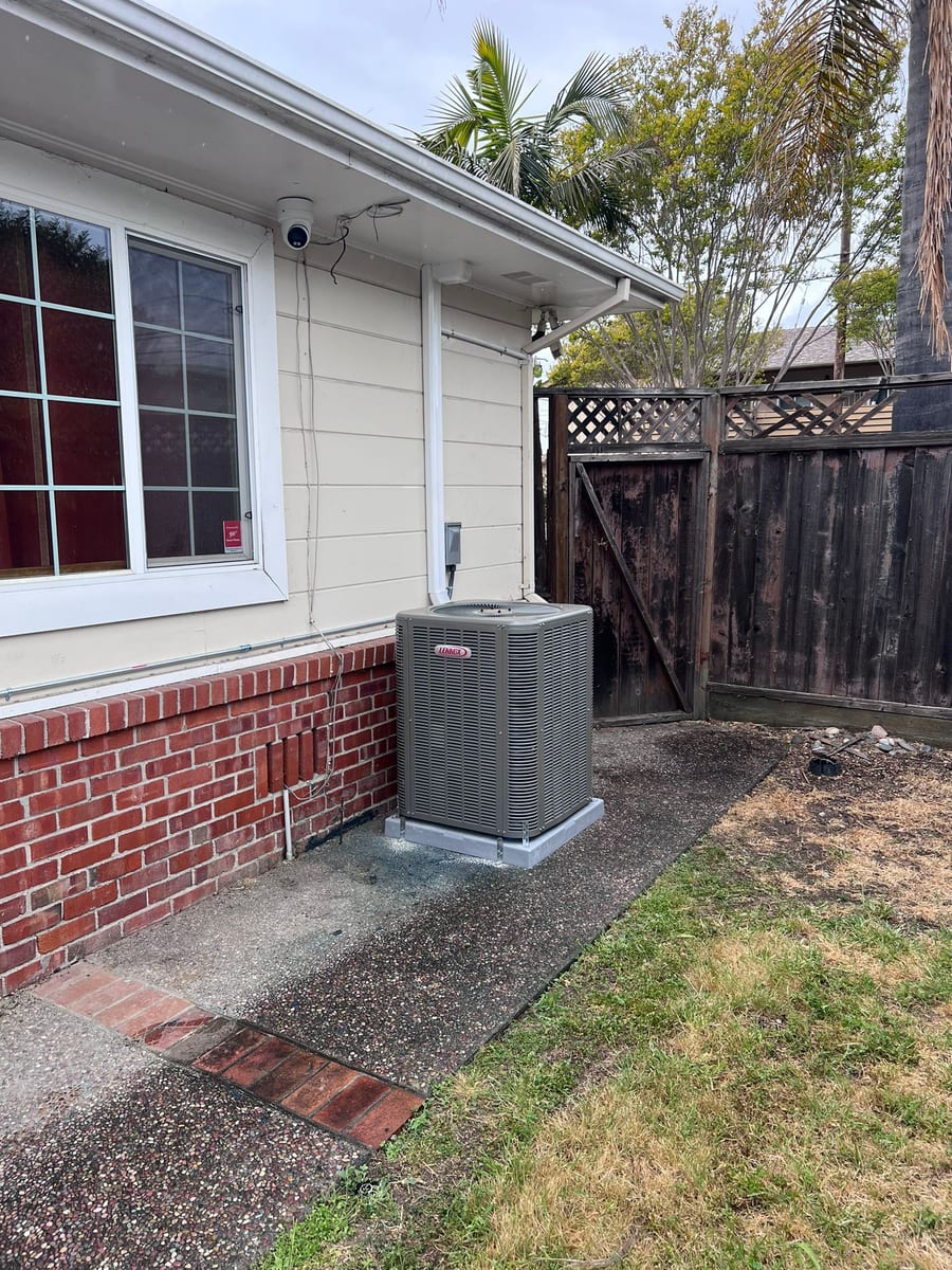 Lennox outdoor condenser installed by Galaxy Heating & Air at a Capuchino Millbrae home