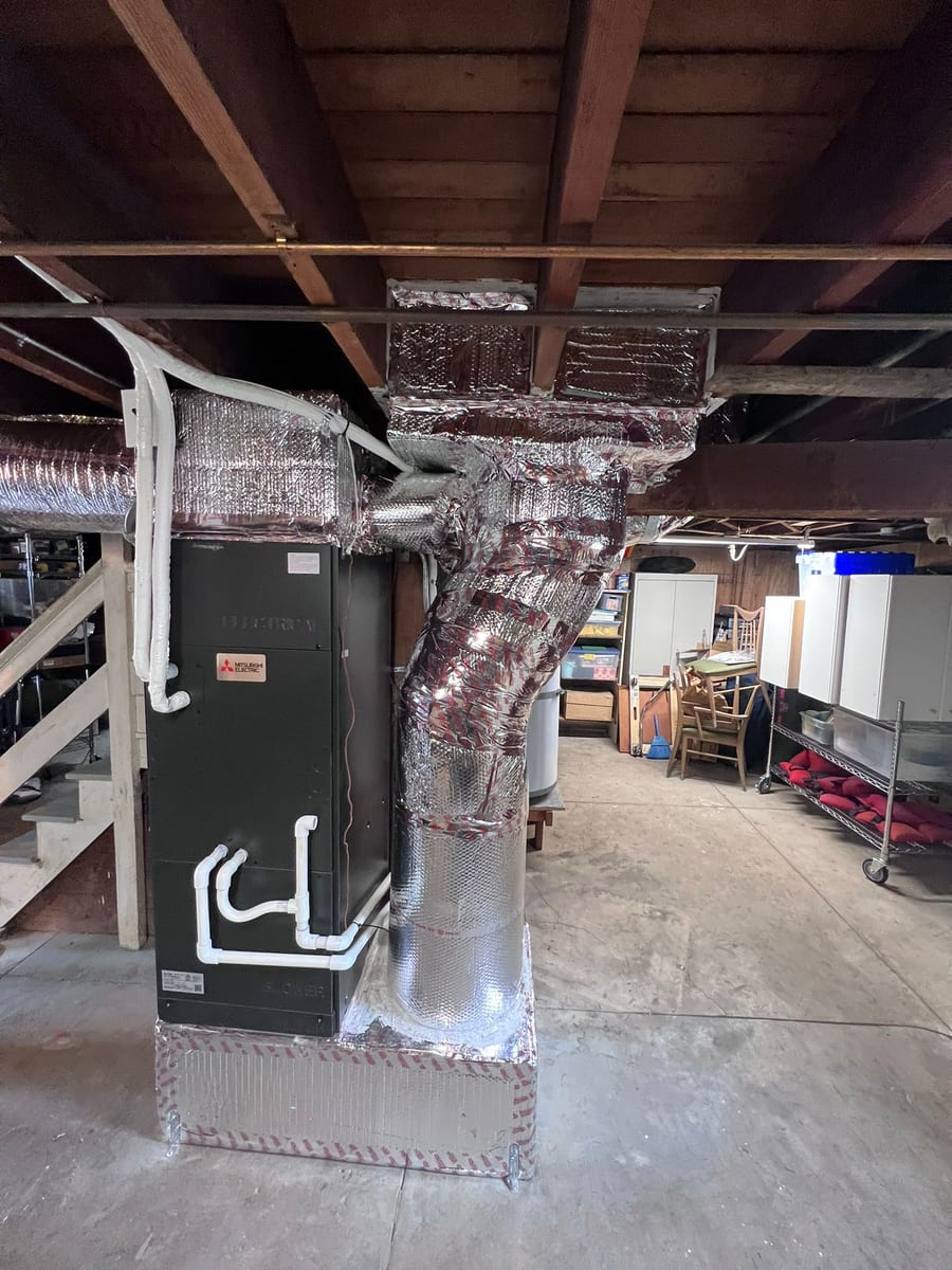 Mitsubishi Electric air handler installed by Galaxy Heating & Air in the basement of a Sinnott Milpitas home