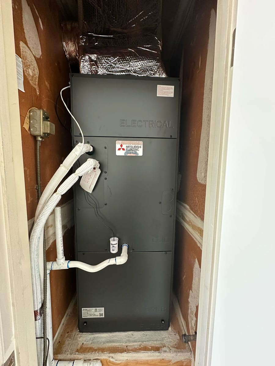 Mitsubishi Electric vertical air handler installed by Galaxy Heating & Air in a closet at a Cuesta Park Mountain View home