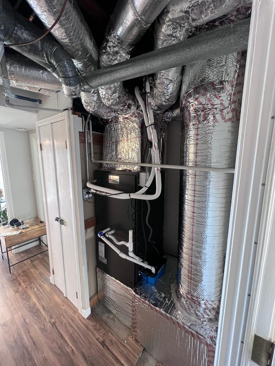 Vertical air handler installed by Galaxy Heating & Air in a closet at an Emerald Hills Redwood City home