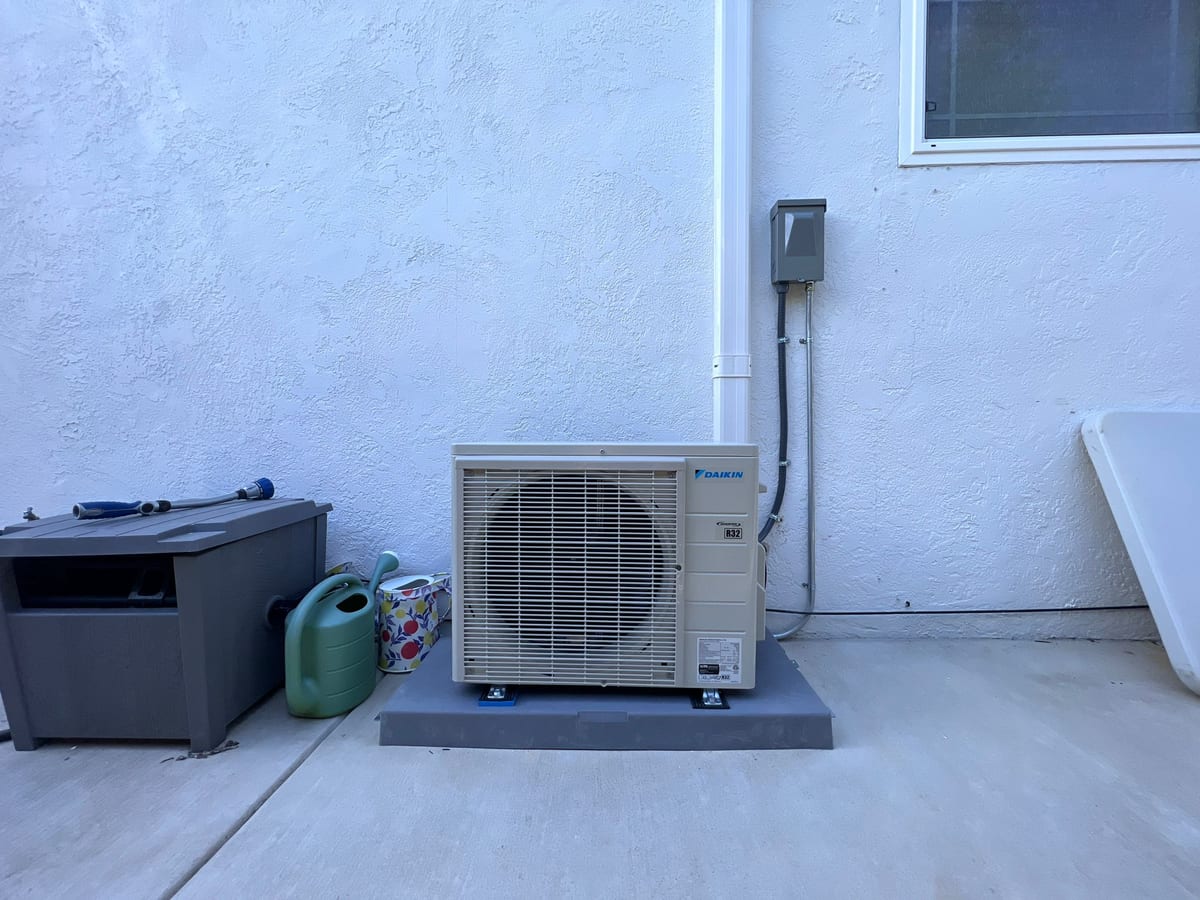 Daikin R32 inverter-driven heat pump outdoor unit installed by Galaxy Heating & Air at a Crestmoor San Bruno home