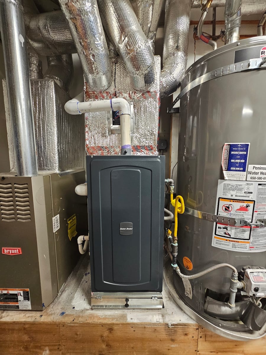 American Standard gas furnace and water heater installed by Galaxy Heating & Air in a Hillsdale San Mateo utility closet