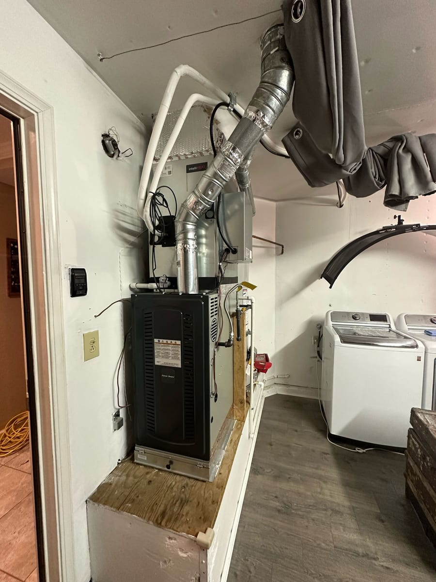 American Standard gas furnace installation by Galaxy Heating & Air in the laundry room of a Saratoga Village home